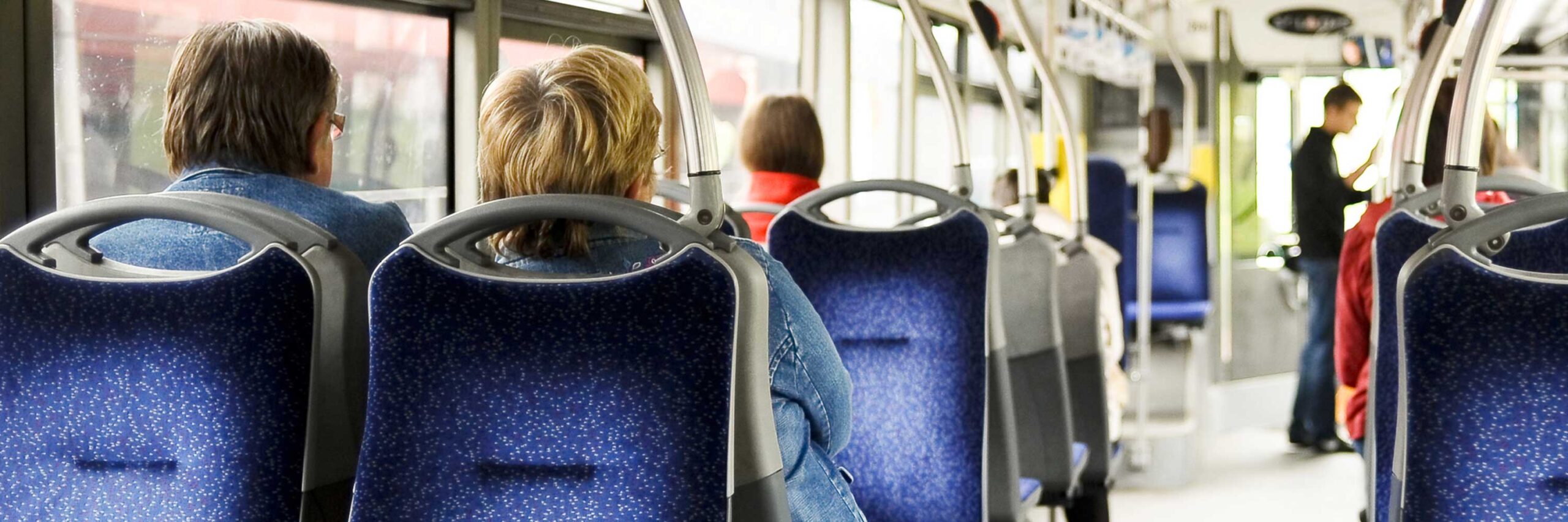People seating on a bus